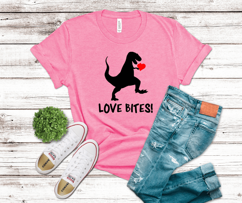 Black T-Rex silhouette holding a bitten red heart above the phrase “Love Bites!” printed on a Hot Peel DTF transfer.
