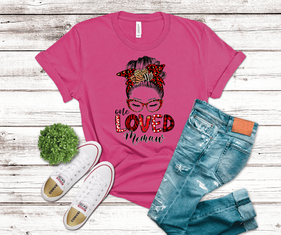 One Loved Memaw shirt featuring leopard and plaid bow messy bun grandma design.