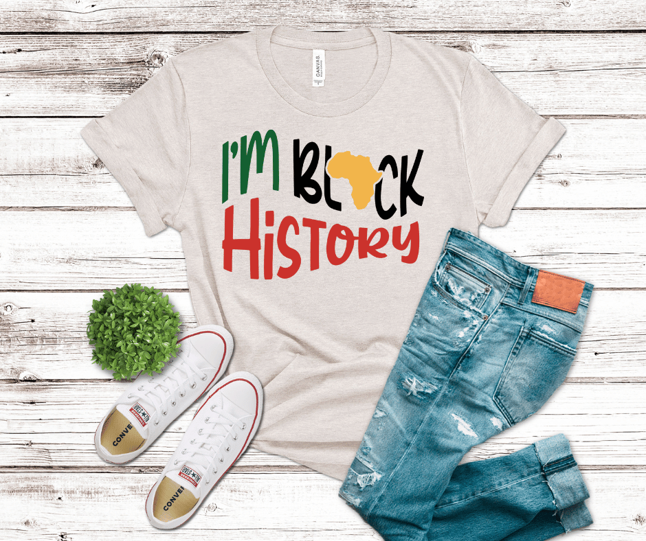 DTF transfer design reading “I’m Black History” with green, red, and black text, a gold Africa silhouette, and a clean minimalist Afrocentric style on light fabric.