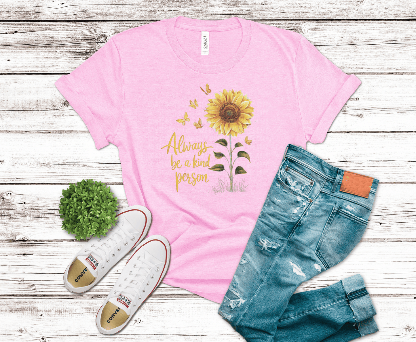 DTF transfer featuring a golden sunflower with butterflies and the phrase “Always be a kind person” in warm yellow script on a black background.