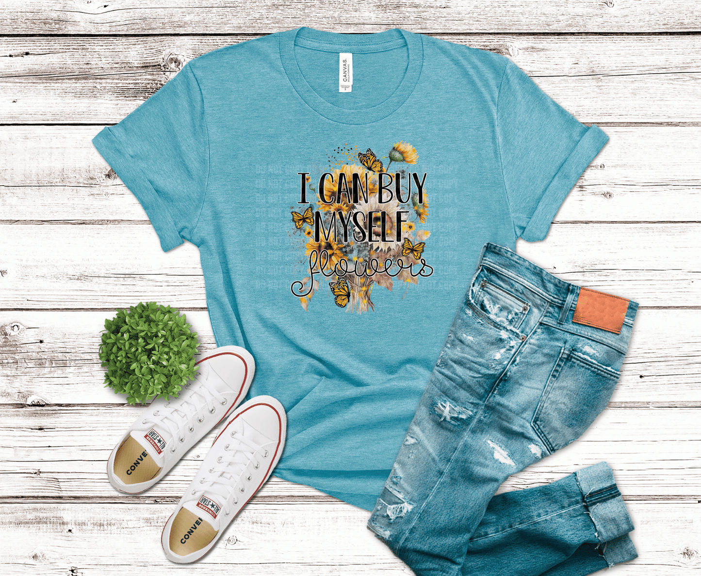 DTF transfer featuring sunflowers and monarch butterflies with the phrase “I Can Buy Myself Flowers” in a bold floral boho style.
