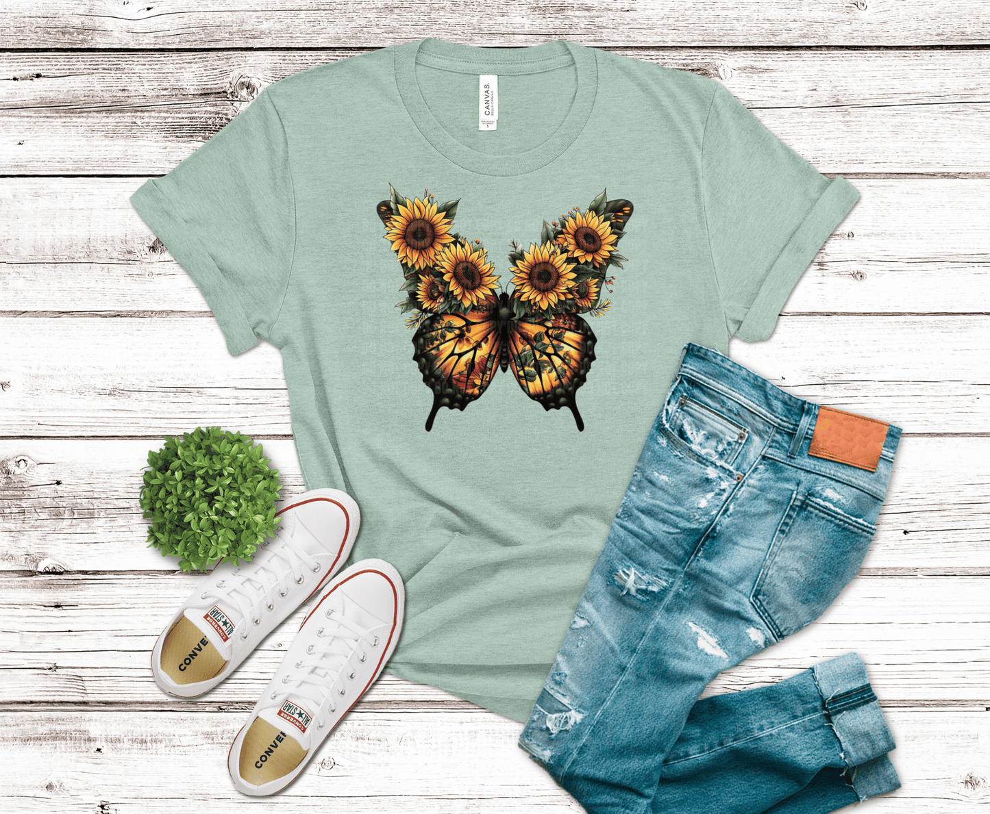 Butterfly with sunflower wings and floral design.