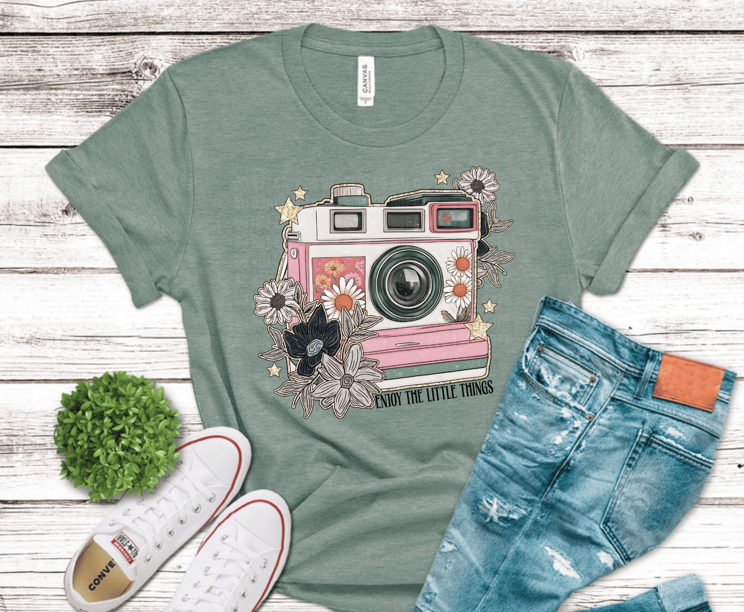Vintage camera with floral accents and Enjoy the Little Things phrase
