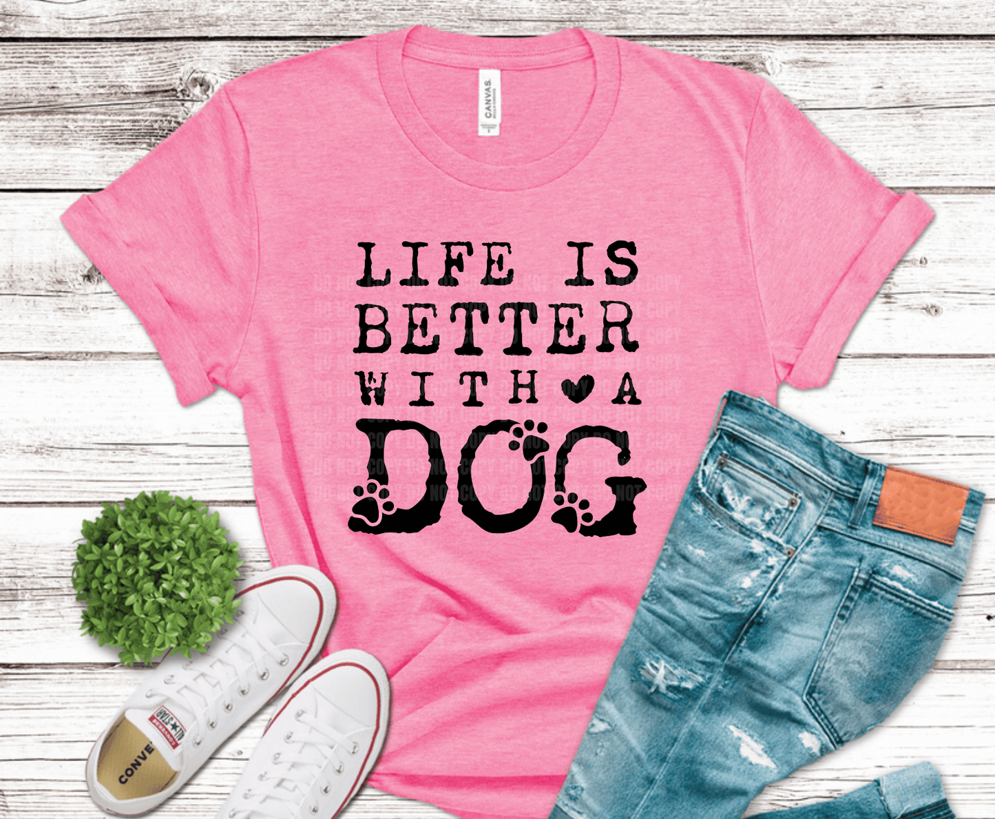 Distressed typography reading Life Is Better With a Dog with paw prints