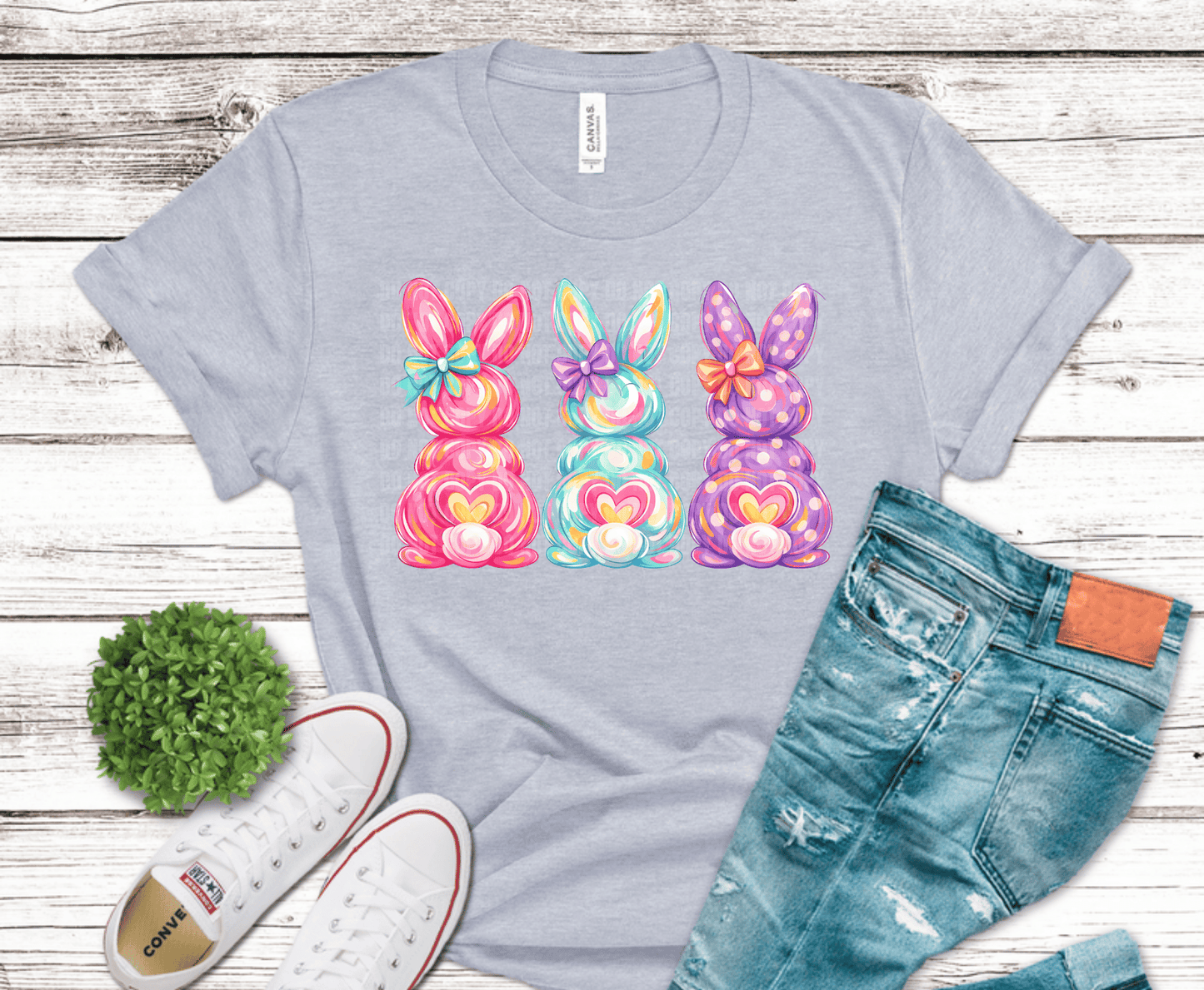 Three pastel Easter bunny silhouettes with bows and heart accents