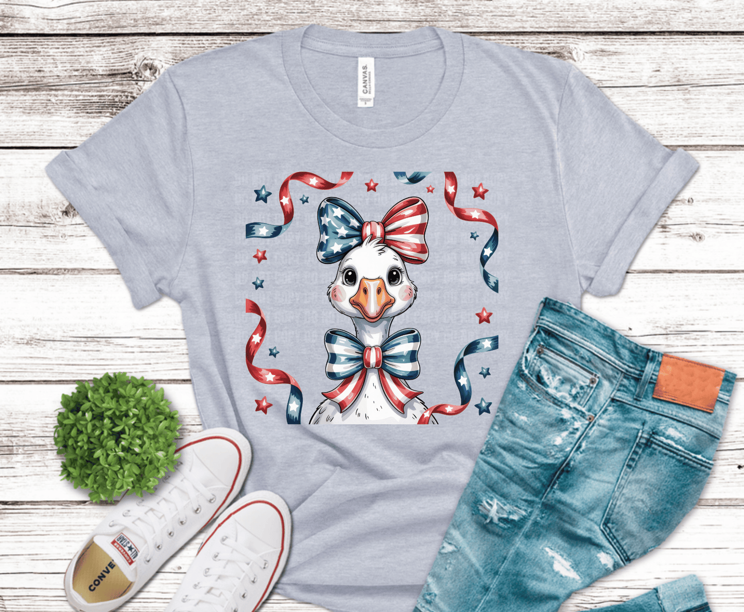 Cute goose decorated with red white and blue patriotic bows and ribbons.