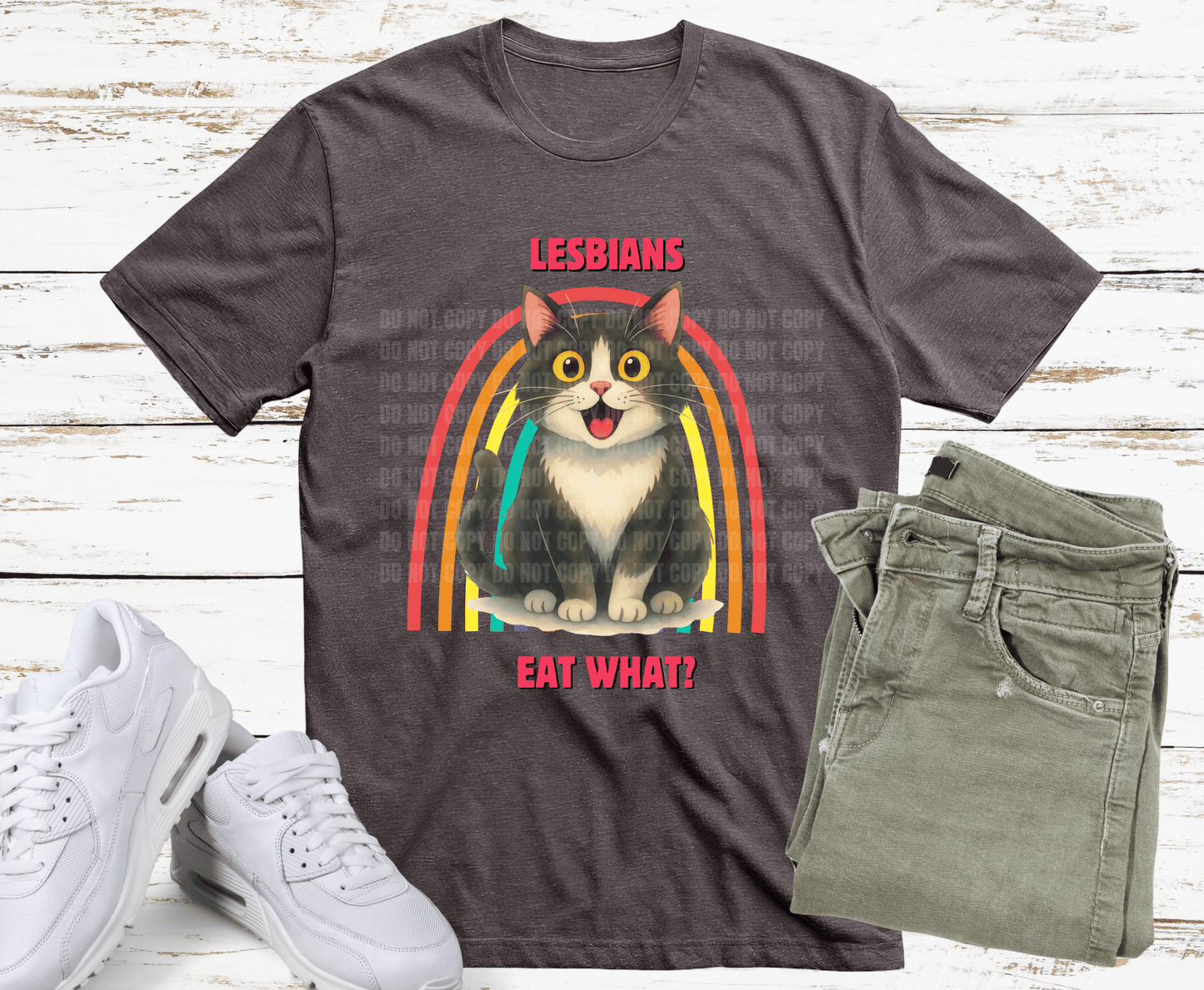 Cat with rainbow background and humorous pride text.