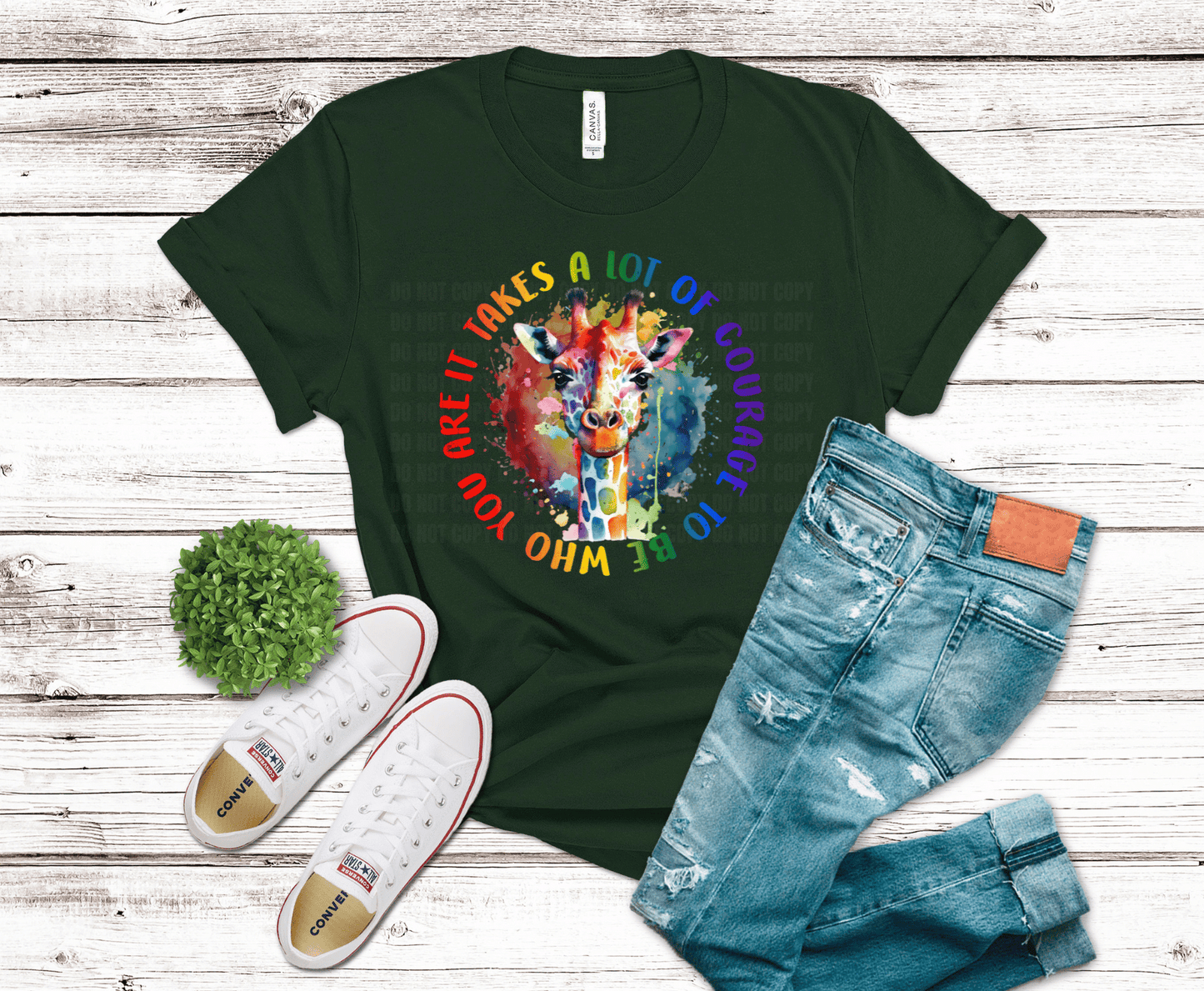 Colorful giraffe face with paint splash background and circular inspirational quote about courage and being yourself