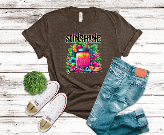 Colorful tropical drink with fruits and text Sunshine Juice.