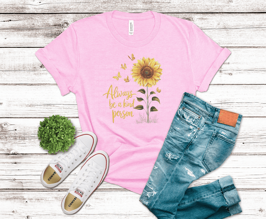 DTF transfer featuring a golden sunflower with butterflies and the phrase “Always be a kind person” in warm yellow script on a black background.