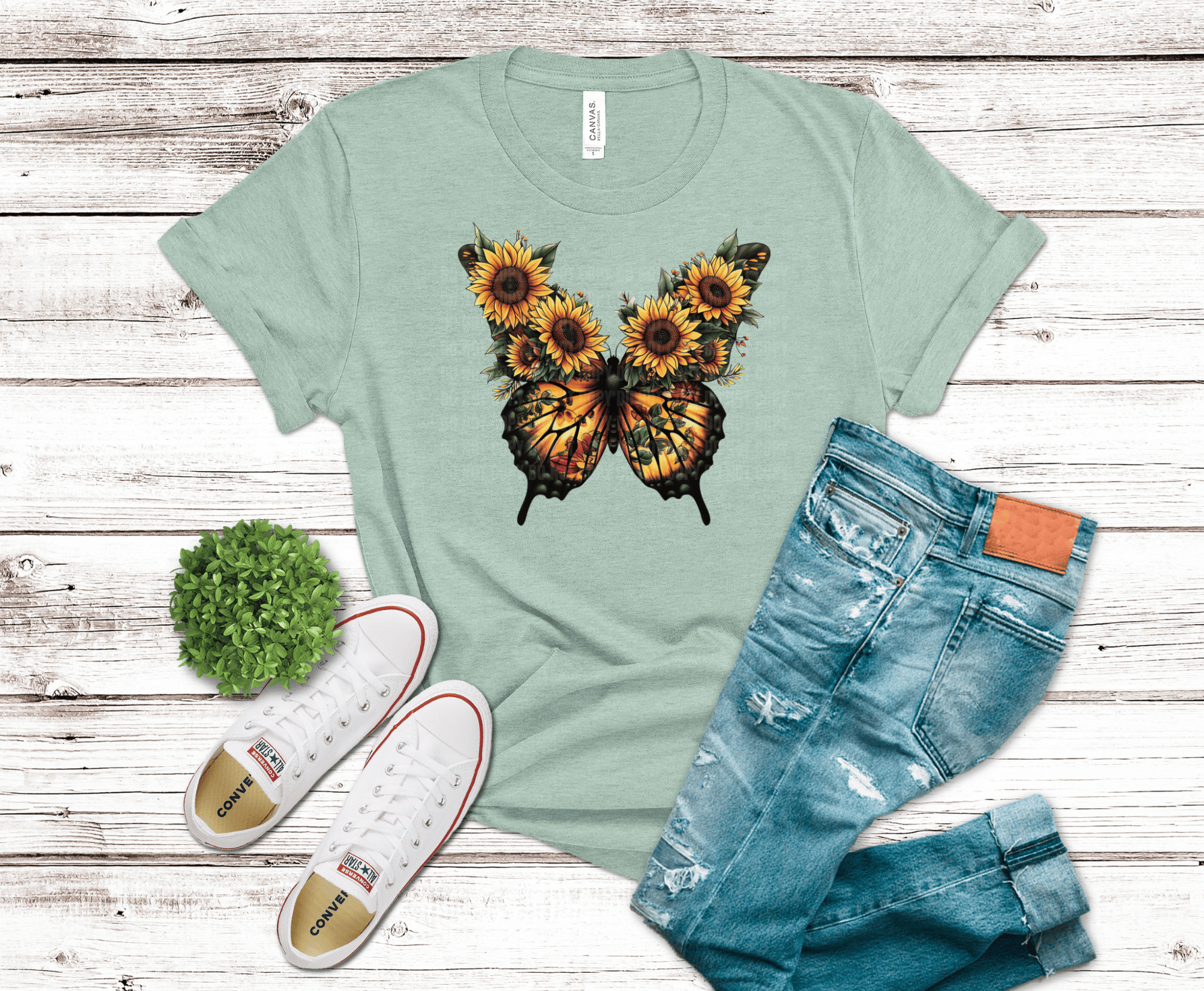 Butterfly with sunflower wings and floral design.