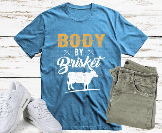 DTF transfer design featuring the phrase “Body by Brisket” with a cow silhouette in a rustic BBQ style on a blue background.