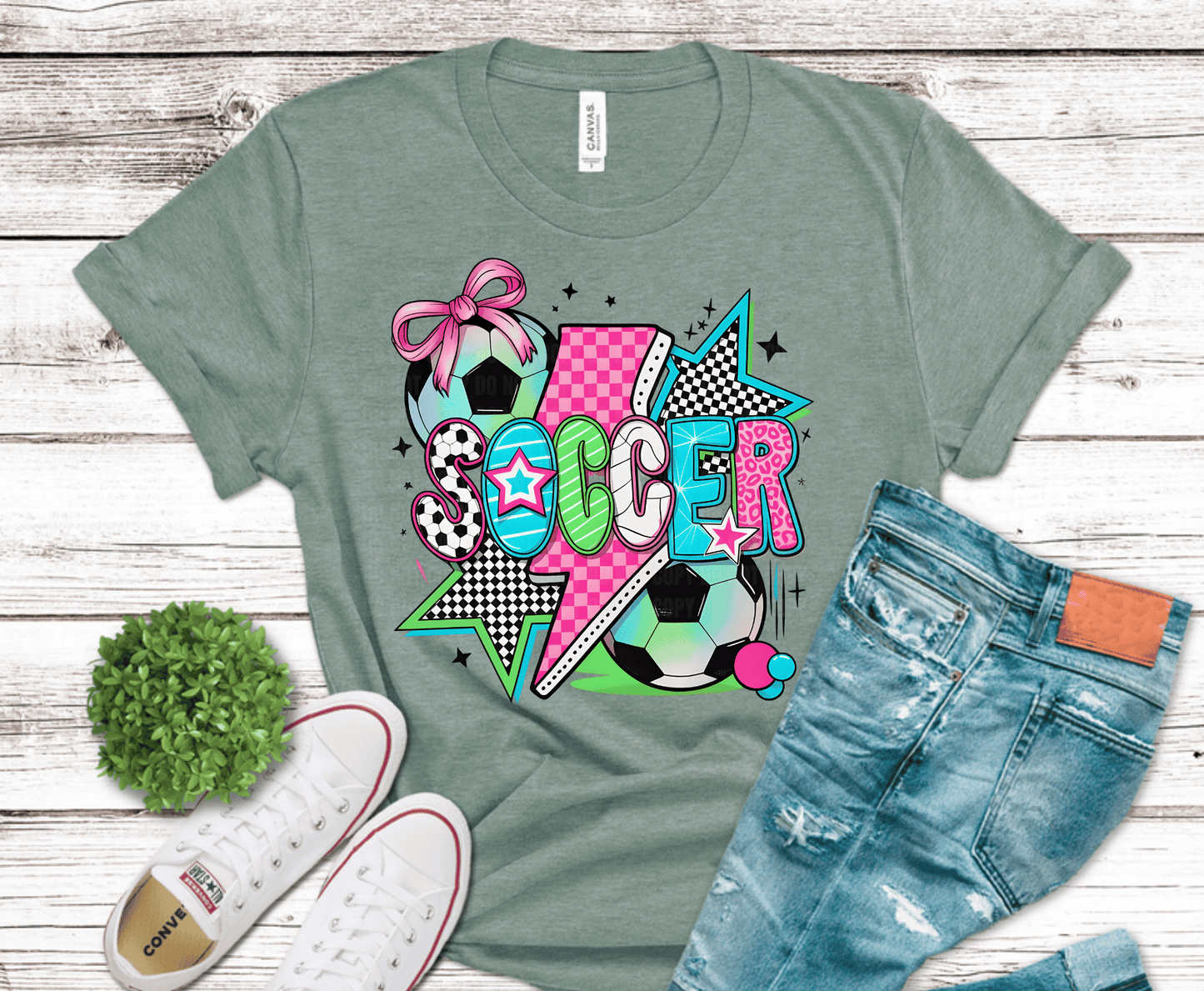 Colorful soccer DTF transfer design featuring bold patterned lettering, soccer balls, stars, and playful neon accents in a fun sporty style.