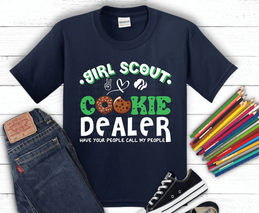 Funny Girl Scout Cookie Dealer DTF transfer with donut and cookie graphics and bold green lettering.