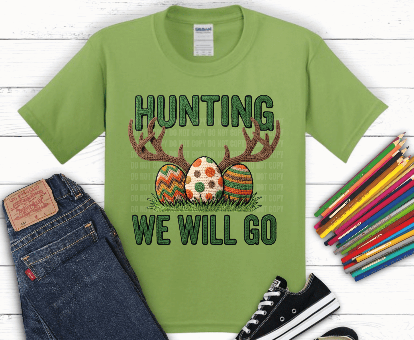 Hunting We Will Go DTF transfer with antlers, crochet Easter eggs, green lettering, and grass for funny hunter Easter shirt design.