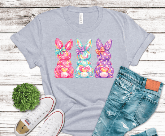 Colorful pastel Easter bunny trio with bows and heart details coquette style DTF transfer design.