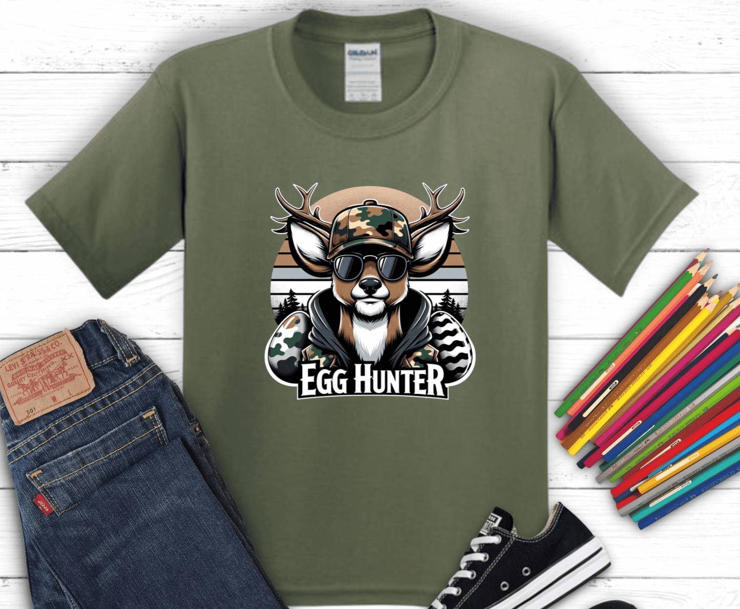 Cool deer wearing camo hat and sunglasses with Egg Hunter text and Easter eggs in rustic hunting style design for boys and men shirts