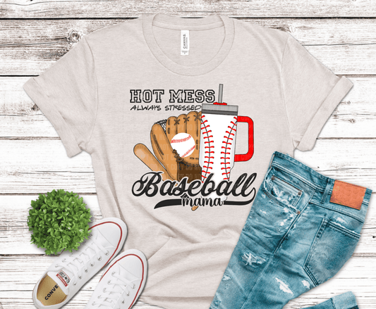 Hot Mess Baseball Mama design with baseball glove, stitched tumbler, and humorous sports mom phrase for game day shirts