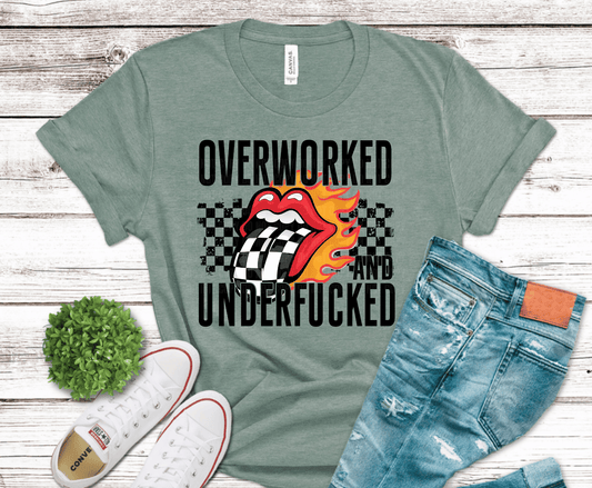 Overworked and underfucked graphic with flaming tongue and bold typography for sarcastic statement shirts