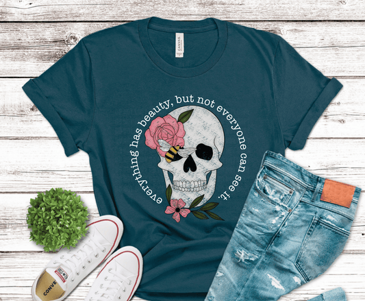 Detailed skull with pink flowers and bee accent for gothic floral shirt design