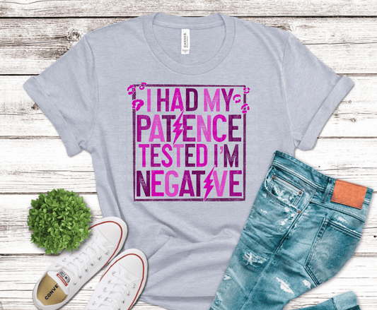 Bold pink typography reading I Had My Patience Tested I’m Negative