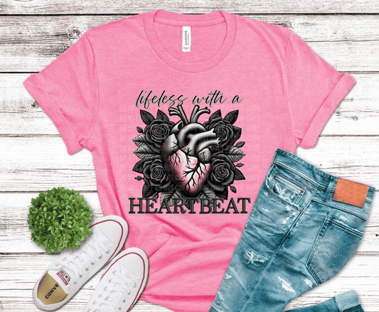 Anatomical heart surrounded by dark roses with Lifeless Without a Heartbeat phrase