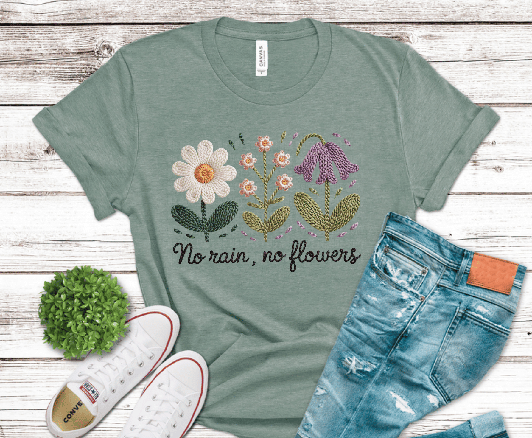 Floral embroidery style design with No Rain No Flowers quote