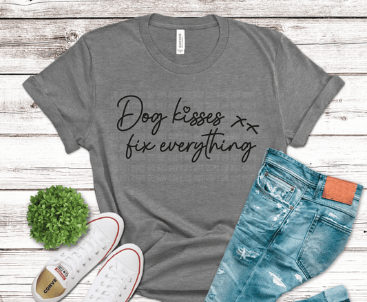 Elegant script typography reading Dog Kisses Fix Everything