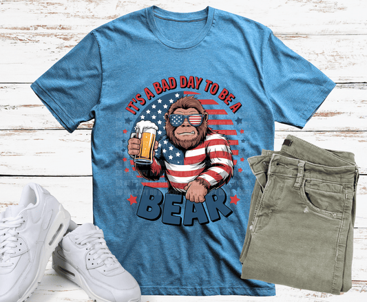 Funny patriotic bear wearing American flag sunglasses holding a beer with text It's a Bad Day To Be A Beer.