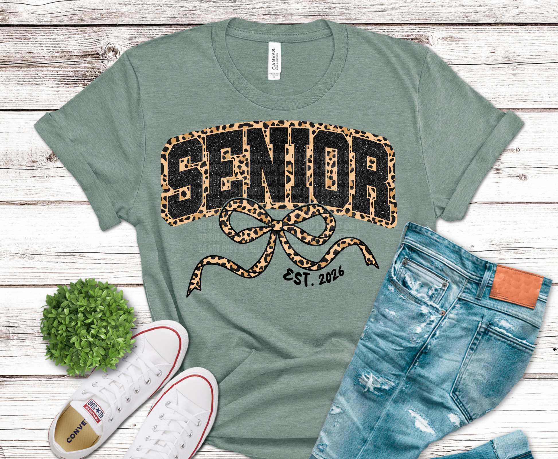 Senior 2026 lettering with leopard print pattern and decorative bow.