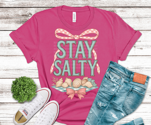 Stay Salty lettering with seashells and beach themed graphics.