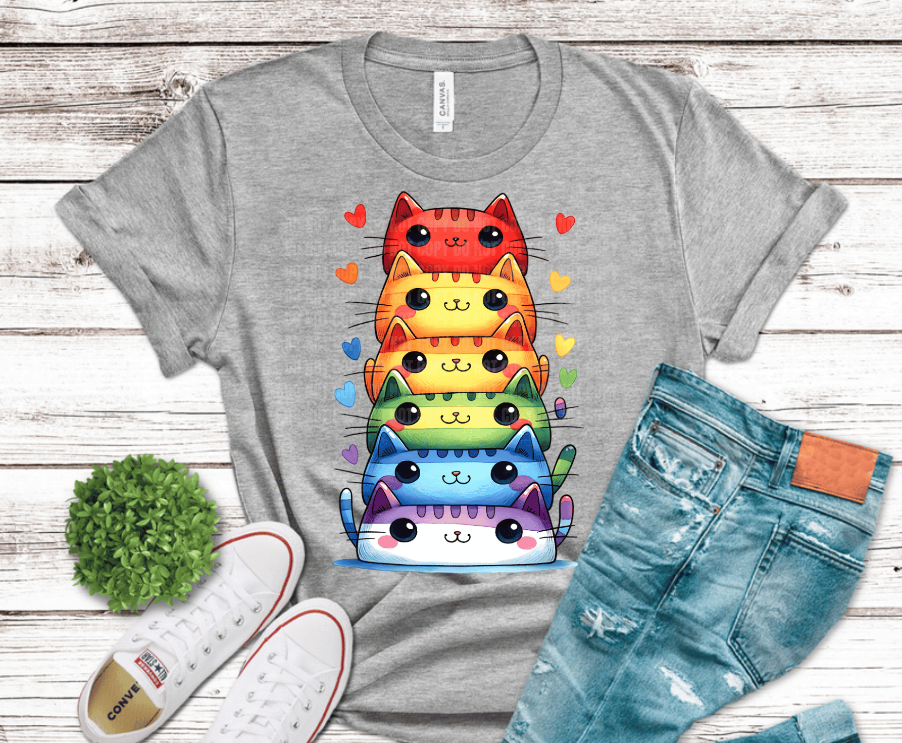 Stacked colorful cartoon cats in rainbow colors.