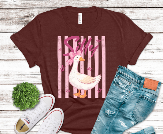 Silly Duck with pink bow on striped background DTF transfer, ready to press heat transfer for whimsical shirts