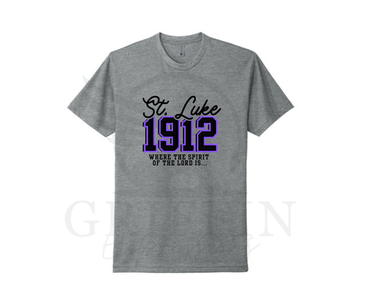 Gray t-shirt with 'St Luke 1912' text design on a white background