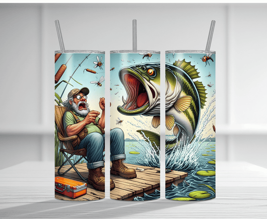 Humorous 20oz tumbler sublimation wrap with cartoon old fisherman on dock looking shocked as a giant largemouth bass jumps at him with mouth open, surrounded by flies, fishing rod, and tackle on a lake scene.