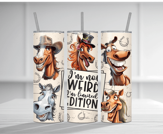Humorous 20oz tumbler sublimation wrap featuring multiple expressive cartoon horses wearing cowboy hats and fancy hats with the bold text "I'm not WEIRD I'm limited EDITION" on a cream background with horseshoes.