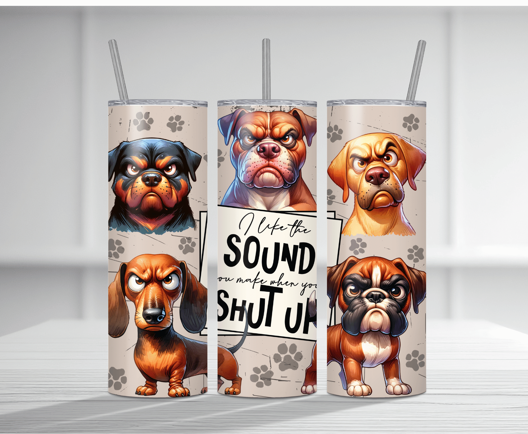 Humorous 20oz tumbler sublimation wrap featuring multiple grumpy angry cartoon dogs with the bold sarcastic text "I like the SOUND you make when you SHUT UP" on a beige paw print background.