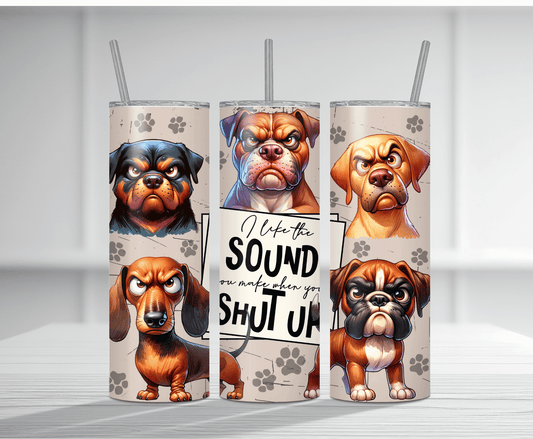 Humorous 20oz tumbler sublimation wrap featuring multiple grumpy angry cartoon dogs with the bold sarcastic text "I like the SOUND you make when you SHUT UP" on a beige paw print background.
